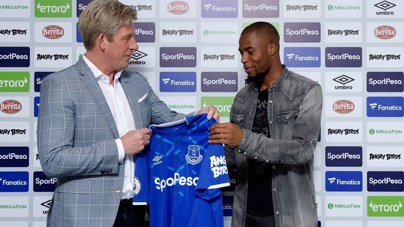 Djibril Sidibe (R) with Everton director of football Marcel Brands