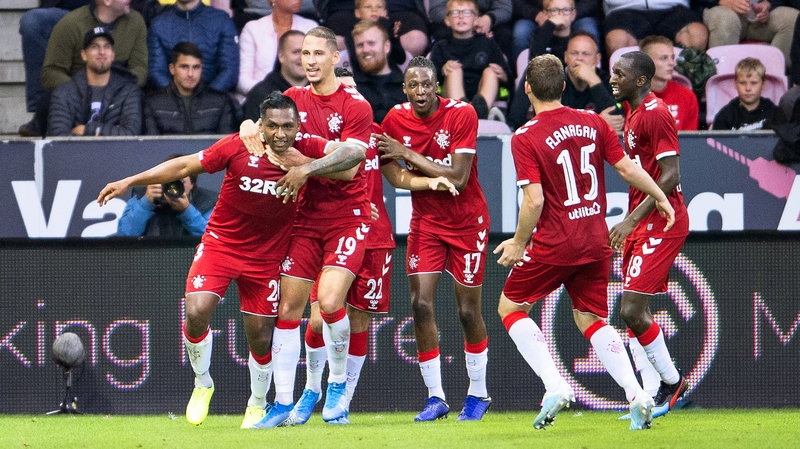 Rangers players celebrate Morelos's opener
