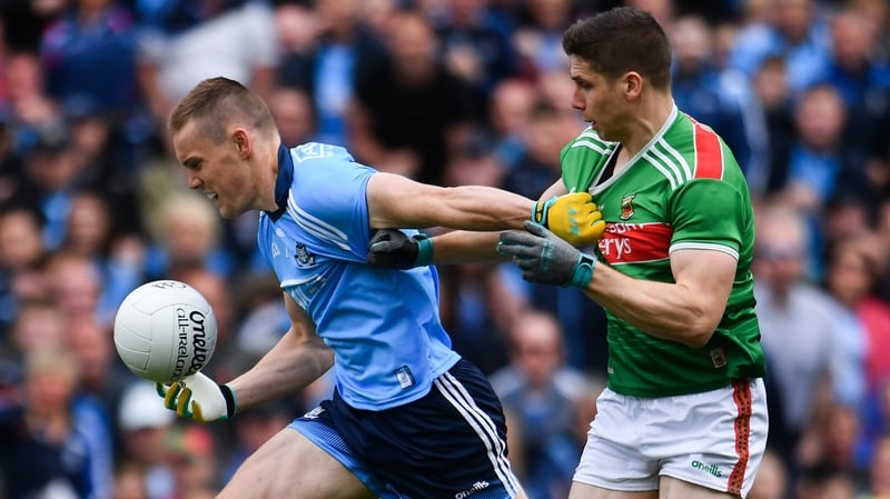 Con O'Callaghan breaks away from Lee Keegan on his way to a goal
