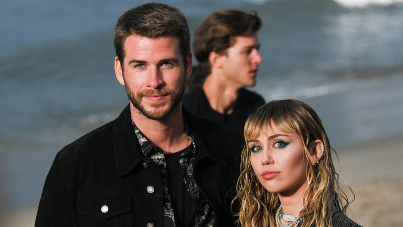 Liam Hemsworth with Miley Cyrus (photographed in June in Malibu, California) - "I wish her nothing but health and happiness going forward"