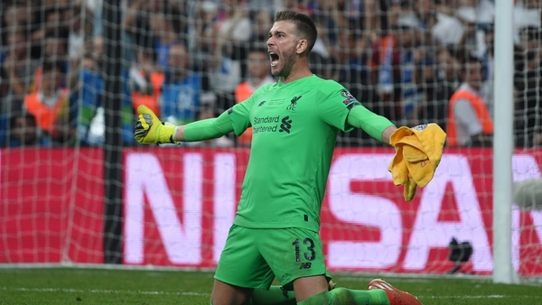 Adrian celebrates saving Tammy Abraham's penalty