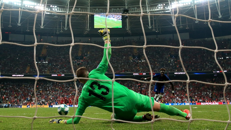 Chelsea's Tammy Abraham has his penalty saved by Liverpool goalkeeper Adrian