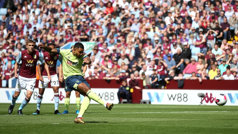 Joshua King scoring from the penalty spot for Bournemouth.
