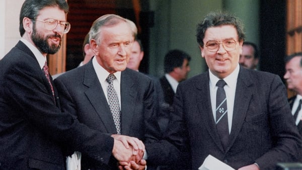 Albert Reynolds is flanked by Gerry Adams (L) and John Hume
