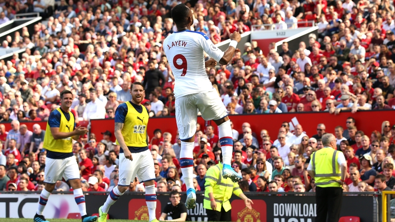 Jordan Ayew celebrates scoring the opening goal at Old Trafford