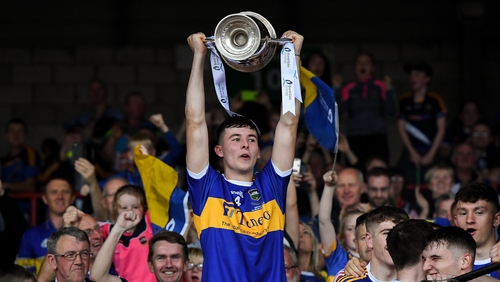 Tipperary U-20 captain Craig Morgan lifts the Cup