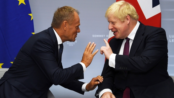 Donald Tusk (L) has spoken to Boris Johnson after today's Commons vote