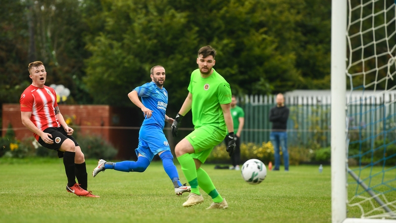 Alan McGreal scores the third Crumlin goal