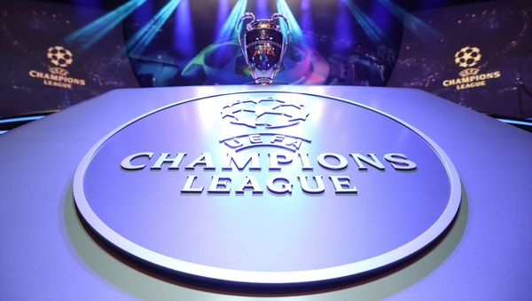 The Champions League trophy stands on display during the UEFA Champions League football group stage draw ceremony
