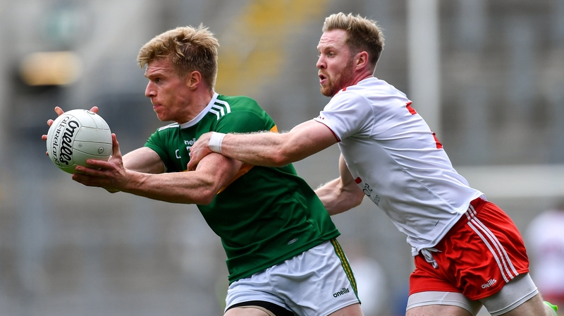 Tommy Walsh of Kerry in action against Frank Burns of Tyrone