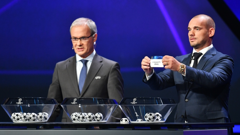 Wesley Sneijder performs the draw in Monaco