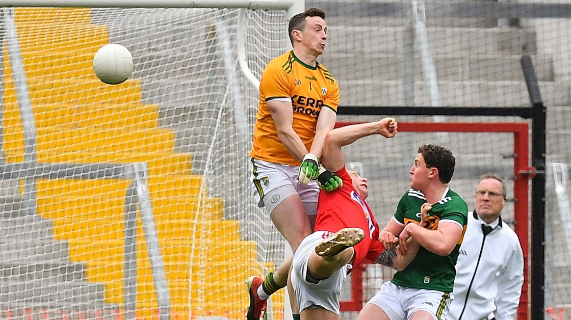 Cork's Brian Hurley gets a touch of the ball before Shane Ryan to score a goal in the Munster final