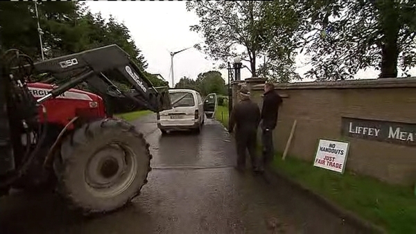 A protester drove his tractor towards a wall at a plant in Cavan