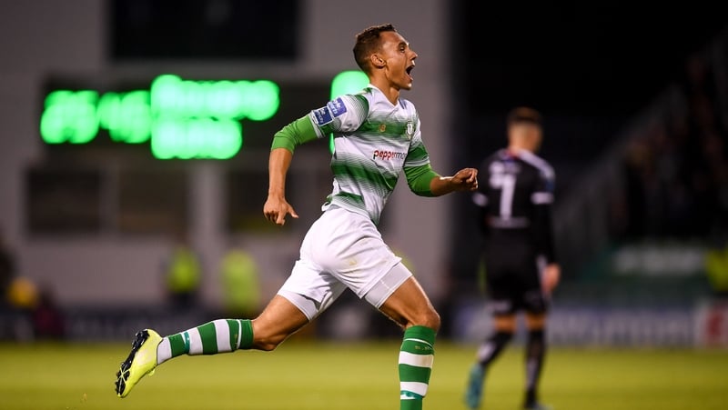 Graham Burke wheels away after scoring for Rovers