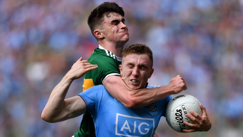 Sean O'Shea fouls Paddy Small to give Dublin one last chance to win the game. They did not take it