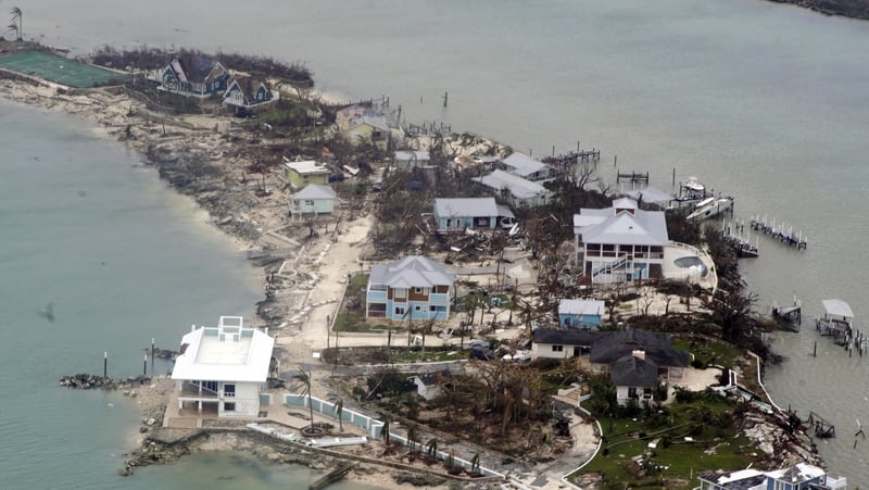 A handout photo made available by the US Coast Guard shows an aerial view of damaged structures in the Bahamas