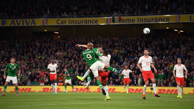 David McGoldrick climbs highest to head home Ireland's equaliser against Switzerland