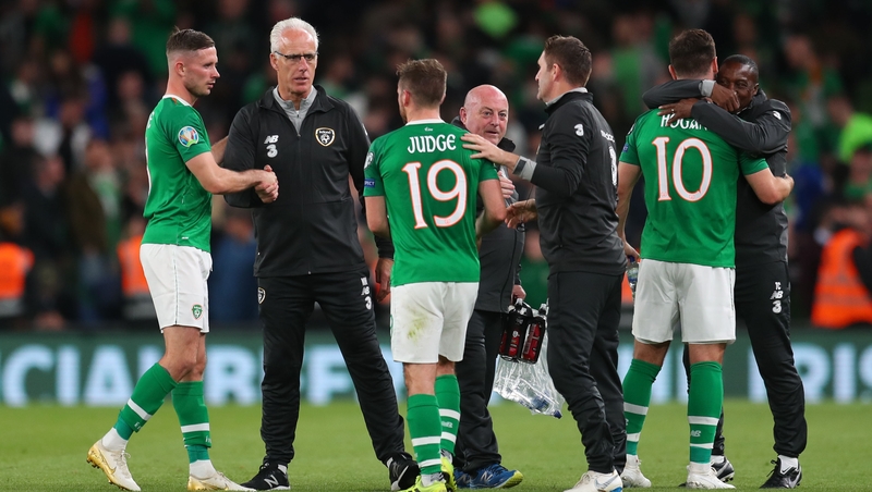 The Irish manager congratulates his players following the 1-1 draw with Switzerland