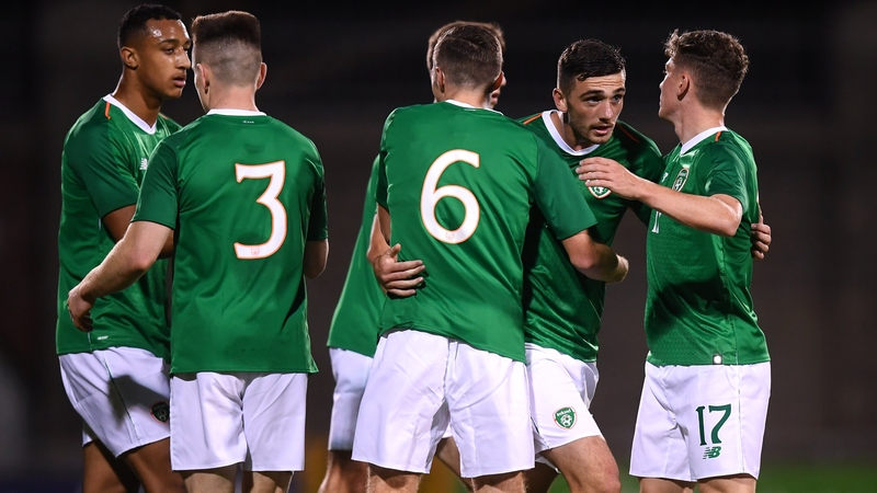 Troy Parrott is congratulated by his team-mates