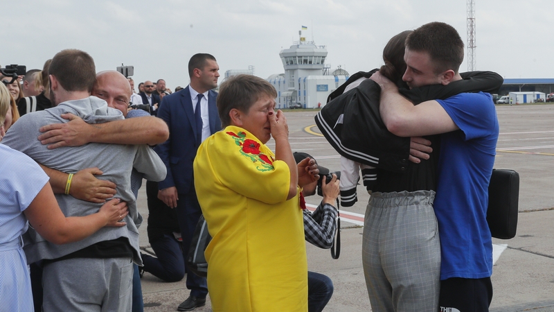 Relatives welcome Ukrainian former prisoners