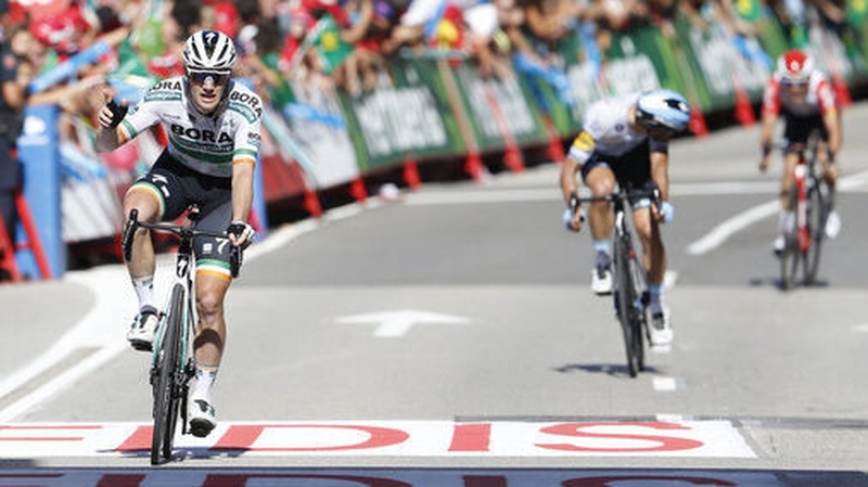 Sam Bennett takes the plaudits at the finishing line