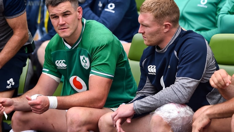 Keith Earls (r) with ice on his left leg