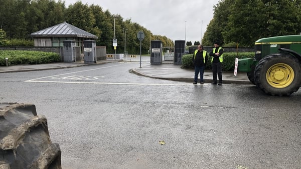 Some farmers are protesting outside the venue for the talks in Kildare