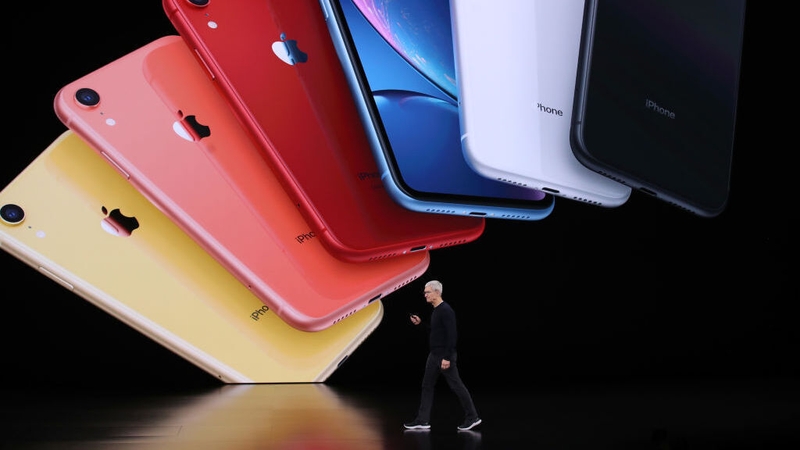 Warren Buffett's Berkshire Hathaway has halved its stake in Apple - the conglomerate's top holding