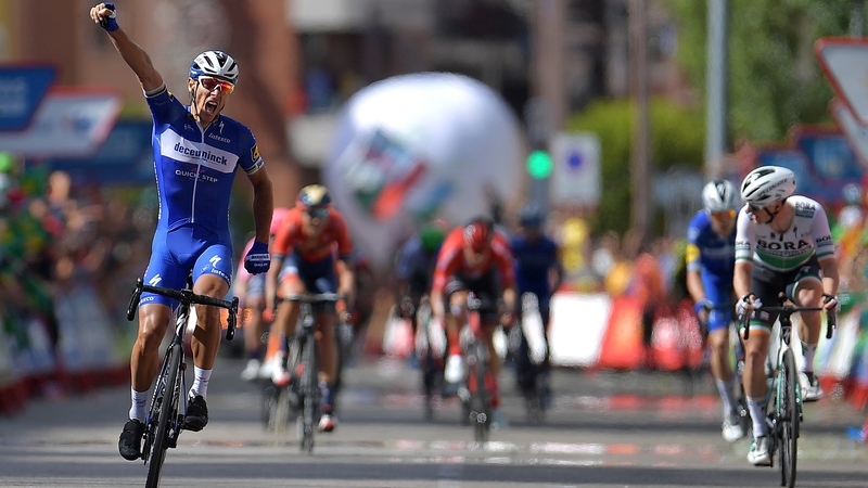 Philippe Gilbert celebrates edging out Sam Bennett
