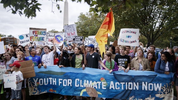 Hundreds of mostly young people gathered across the street from the White House for the protest