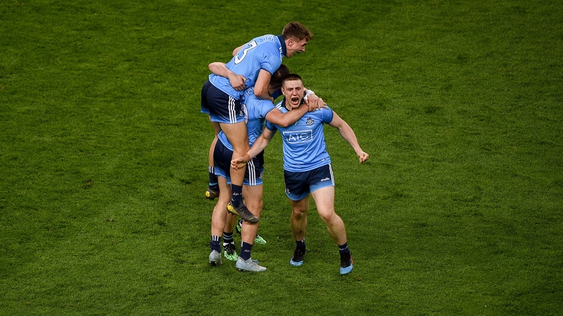 L-R: Michael Fitzsimons, Niall Scully and John Small celebrate at the full-time whistle