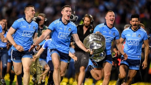 John Small, Brian Fenton, Ciarán Kilkenny and Cian O'Sullivan celebrate with Sam Maguire