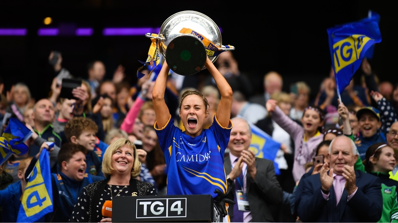 Samantha Lambert hoists the cup at Croke Park