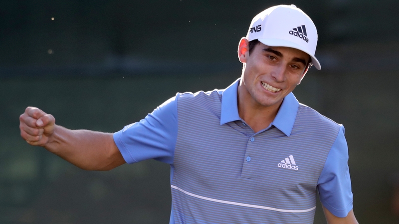 Joaquin Niemann celebrates his victory on the 18th green