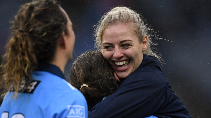 Nicole Owens embraces her team-mates after Dublin's All-Ireland victory