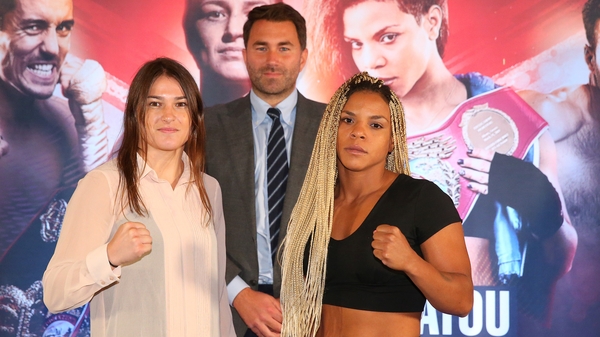 2012 Olympic champion Katie Taylor (L) is unbeaten in 14 professional fights