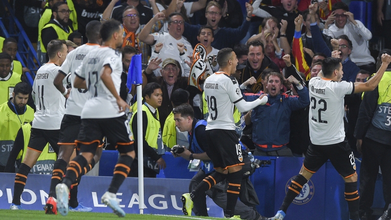 Rodrigo Moreno celebrates with the travelling fans