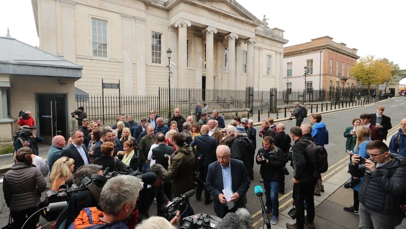 Victims' relatives pictured outside the court in Derry