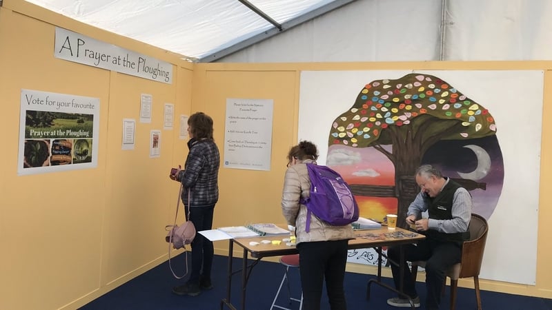 Visitors at the National Ploughing Championships voting for their favourite prayer
