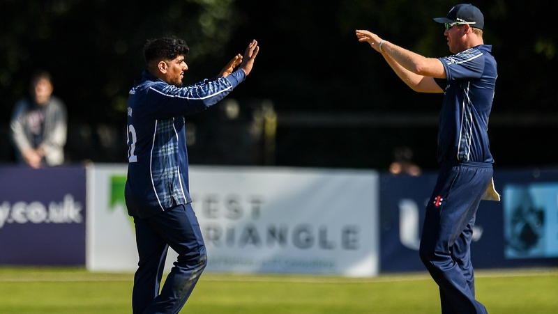 Hamza Tahir (left) had a great day for the Scots at Malahide Cricket Club