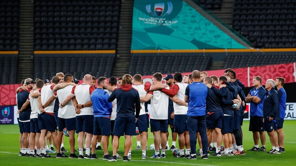 England team in a huddle at the Sapporo Dome