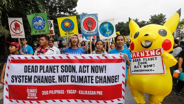 Advocates for environmental protection rally in solidarity with the Global Climate Strike at the University of the Philippines in Quezon City