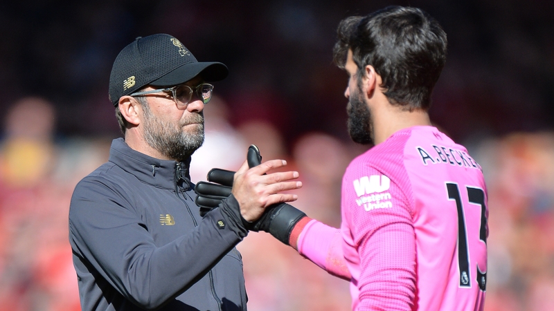Jurgen Klopp says Alisson (R) has returned to training