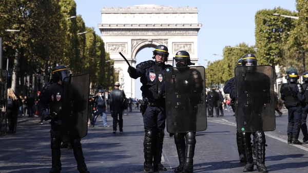 Police secure a street near the Champs Elysees during the yellow vest movement demonstration today