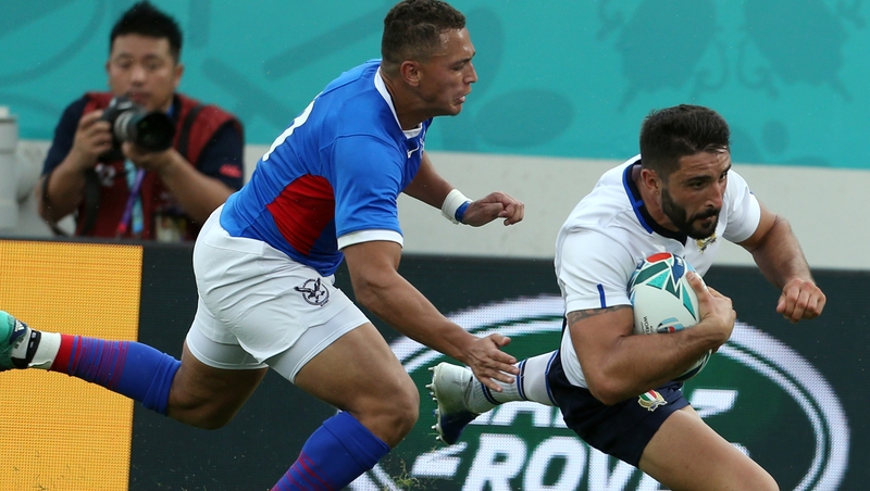 Tito Tebaldi of Italy gets over for a try