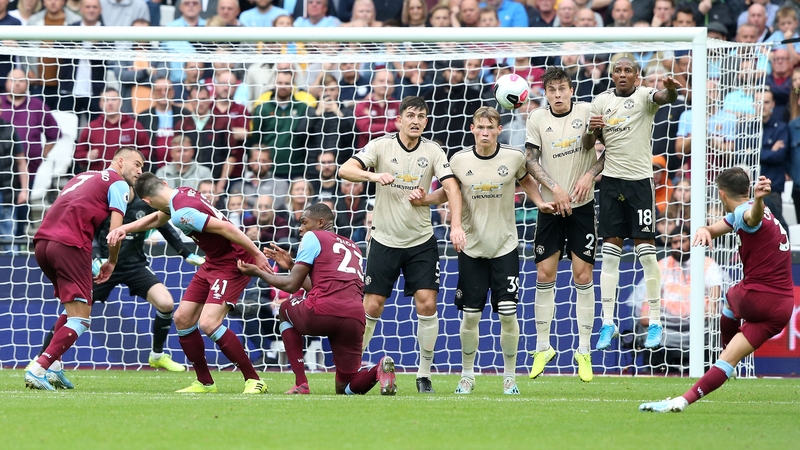 Aaron Cresswell scores from a free-kick