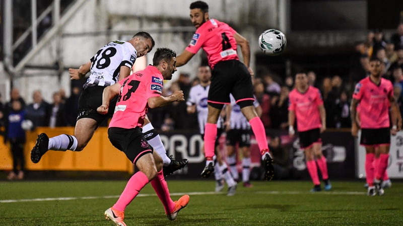 Robbie Benson head's home his side's second goal in the 3-2 win over Shamrock Rovers