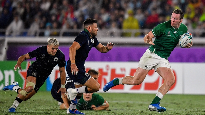 Ali Price (centre) has returned home from Japan