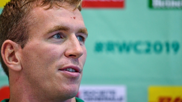Farrell speaks to the media in Japan