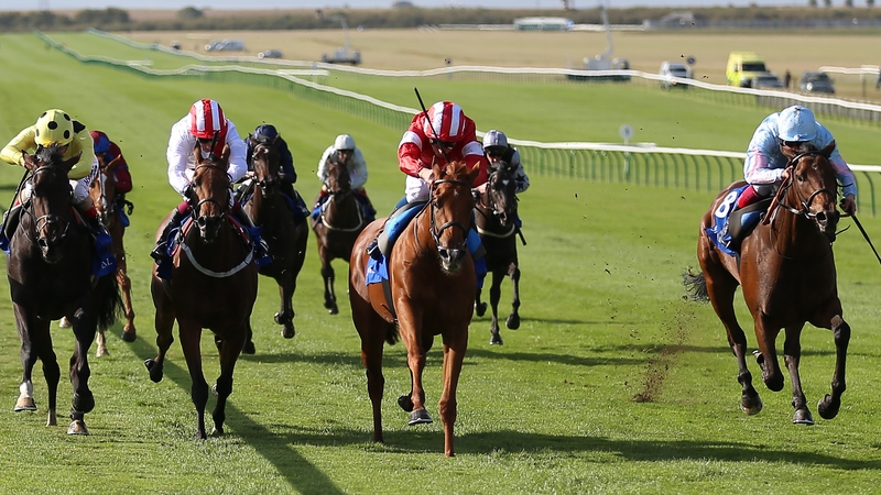 William Buick (red silks) partners the chestnut filly Daahyeh to a first win at Group Two level